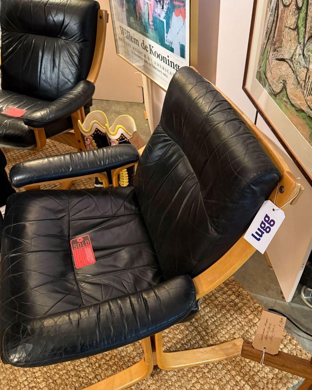 Lugg delivery tag hanging from a vintage chair set at Material Matters NYC